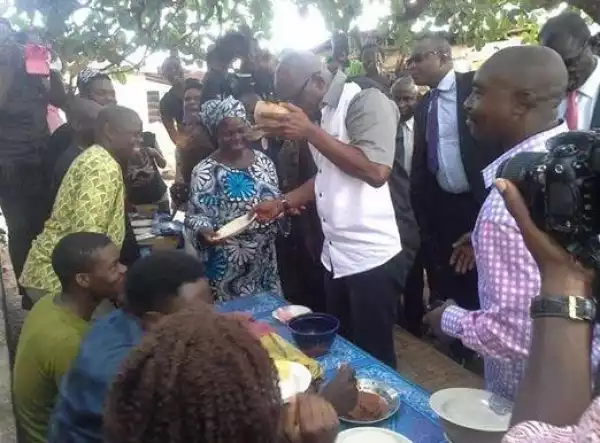 Gov. Ayo Fayose Pictured Drinking Palmwine With Ekiti Residents At A Local Joint [See Photos]